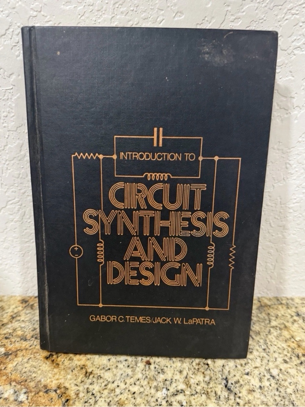 Circuit Synthesis and Design Hardcover Book - Black with Gold Text
